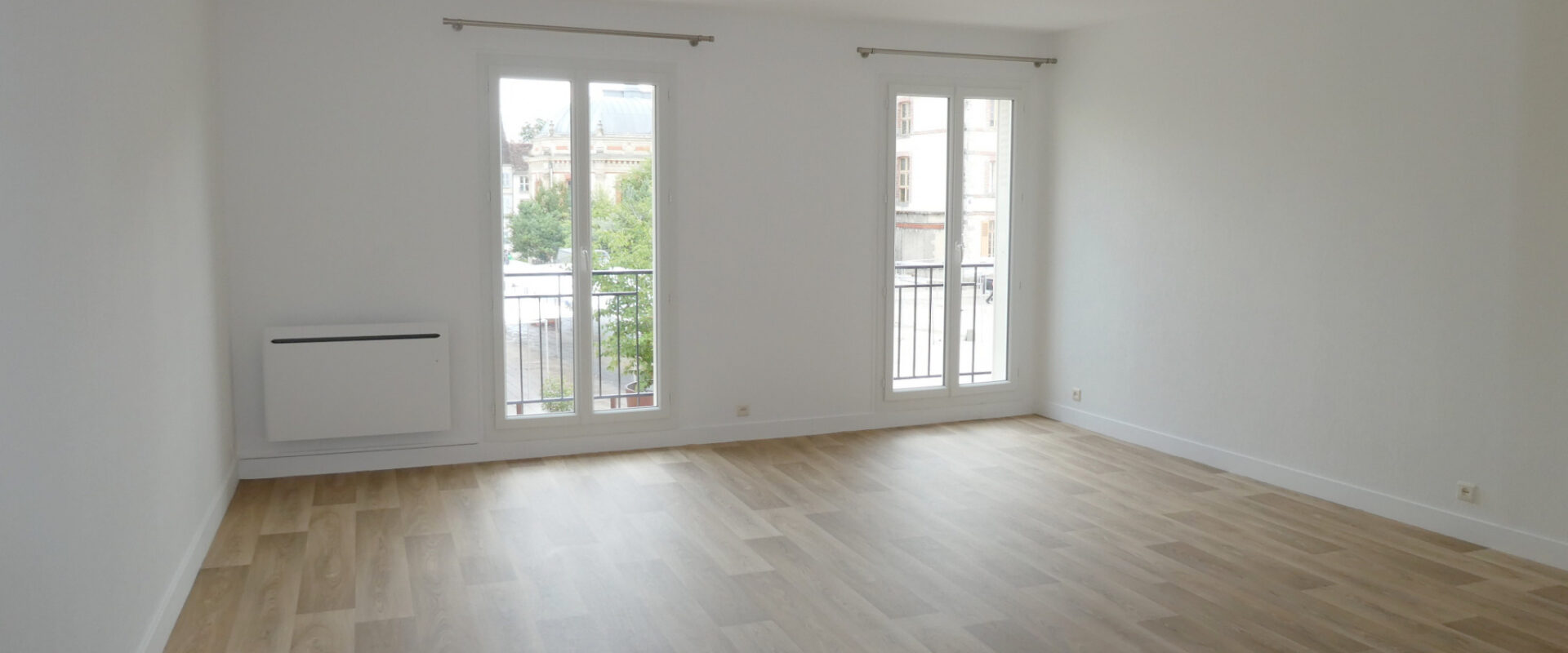 APPARTEMENT 3 PIÈCES 94 m2 EN CENTRE VILLE