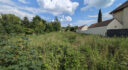 SOUS COMPROMIS. Terrain constructible de 590 m2 facade 9.07 m
