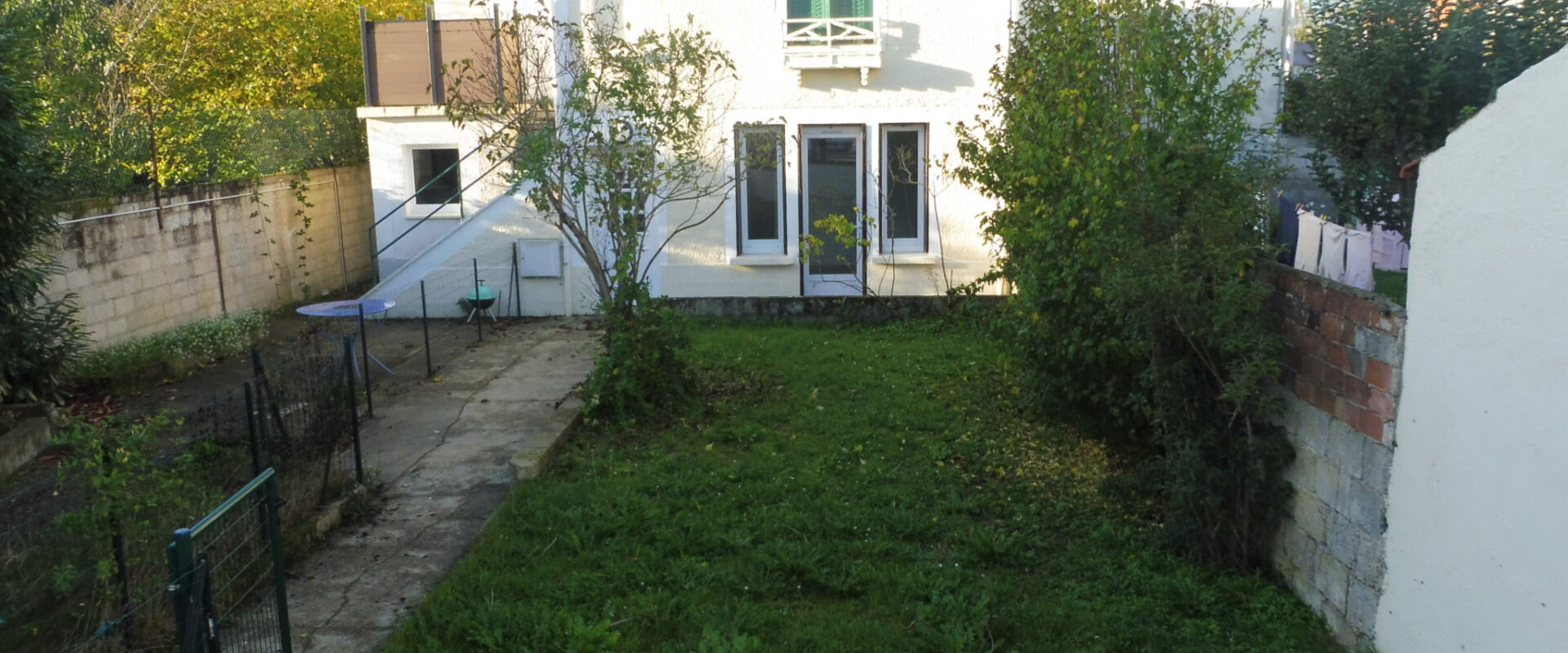 APPARTEMENT 3 PIÈCES AVEC JARDIN