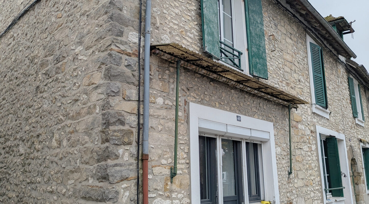 Immeuble de 5 logements + jardin