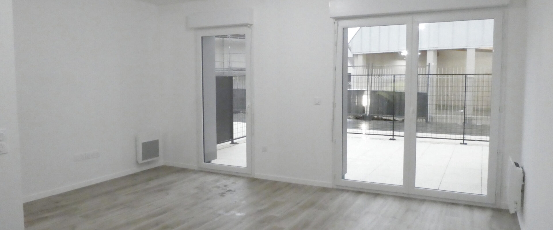APPARTEMENT 2 PIÈCES NEUF AVEC TERRASSE ET PARKING
